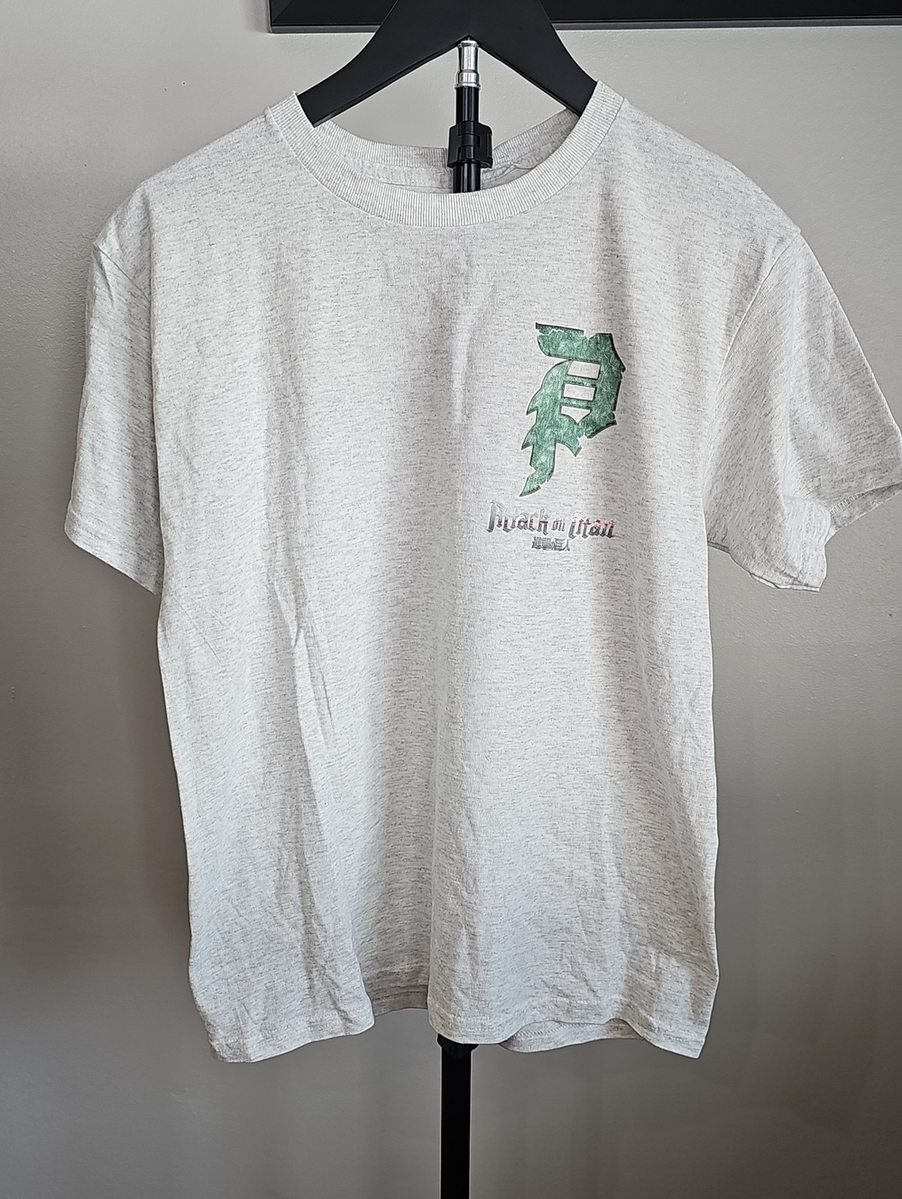 Primitive White Short Sleeve Tee with Green Chest Graphic